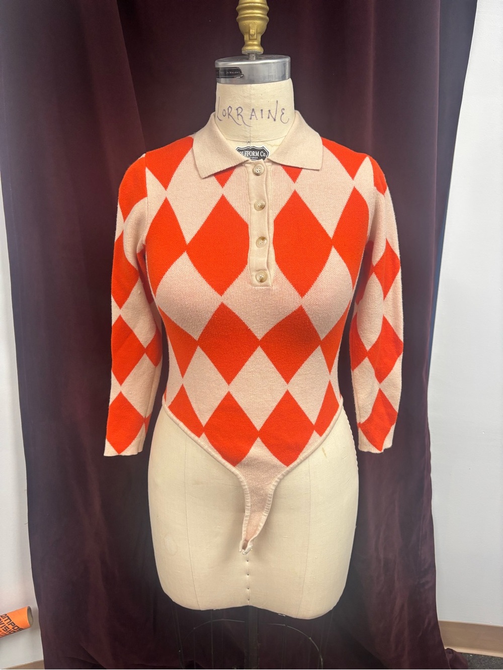 Women's Orange & Cream Argyle Polo Bodysuit size 10